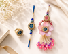 Pink Bloom Nazariya Rakhi Ring Set